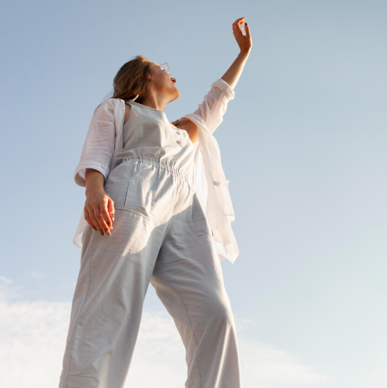 Woman stretching outdoors in the sunshine