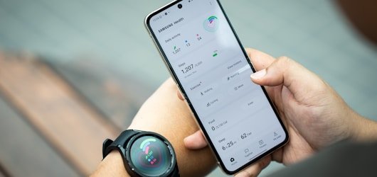 Smartwatch and phone showing health tracking data