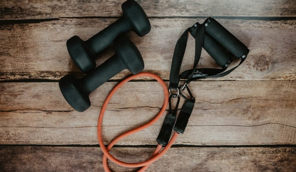 Dumbbells and a resistance band for strength training at home