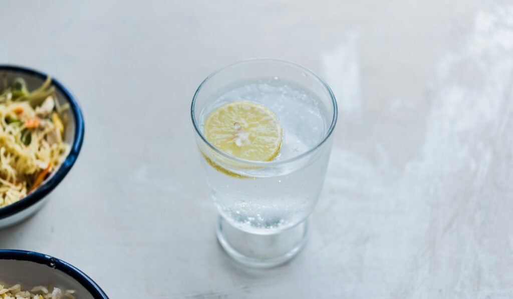 Glass of water with a slice of lemon